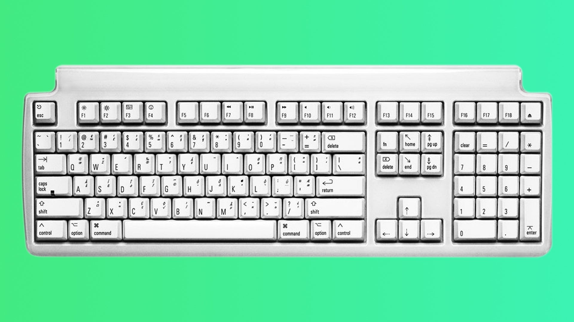 Bàn phím cơ Matias Tactile Pro màu trắng với layout full-size và nhiều ký hiệu phụ