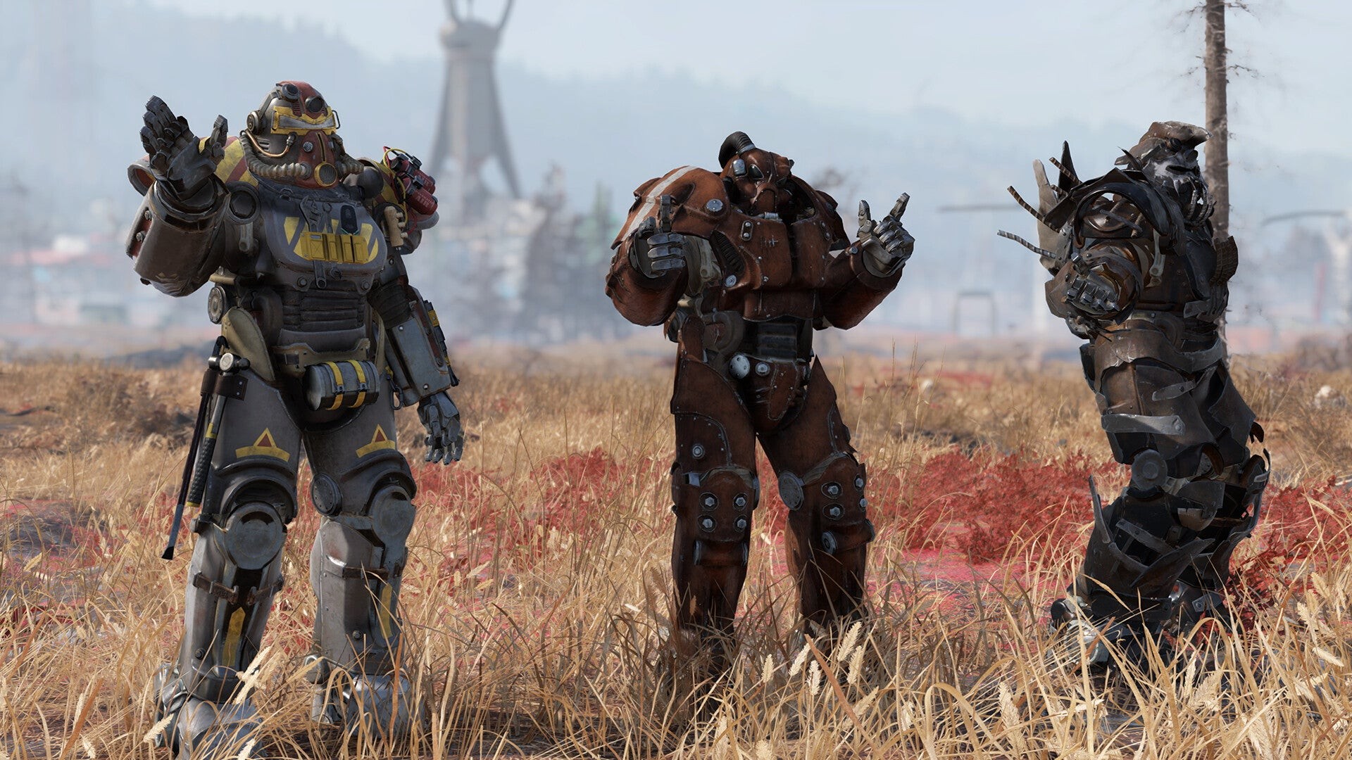 Ba người chơi đứng hàng ngang trong bộ giáp năng lượng trong Fallout 76.