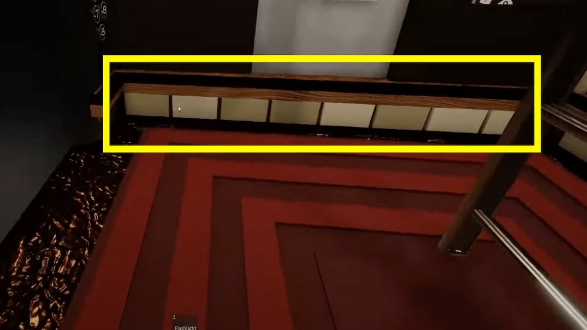 Đèn kỳ nhông ở chân tường thang máy Terminal Escape Room