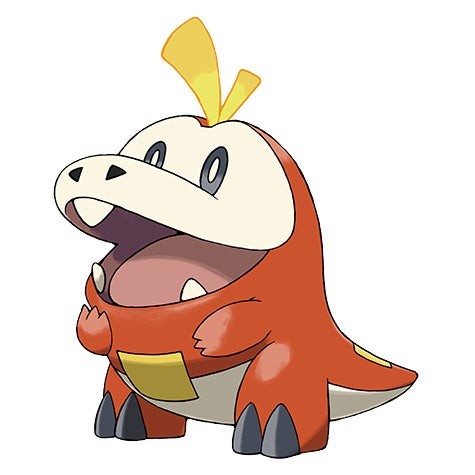 fuecoco đứng trên bãi cỏ trong pokemon go