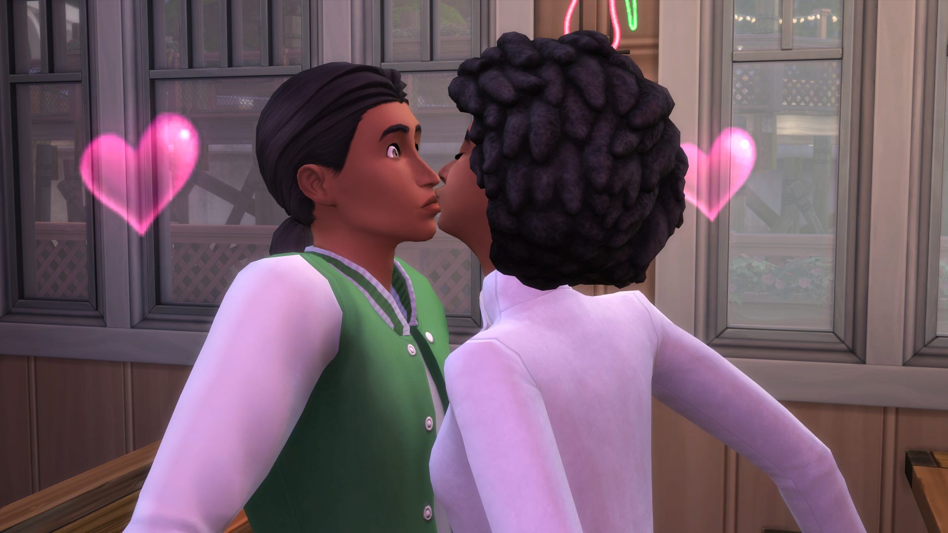 Hai Sim đang hôn nhau trong The Sims 4, thể hiện mối quan hệ lãng mạn.