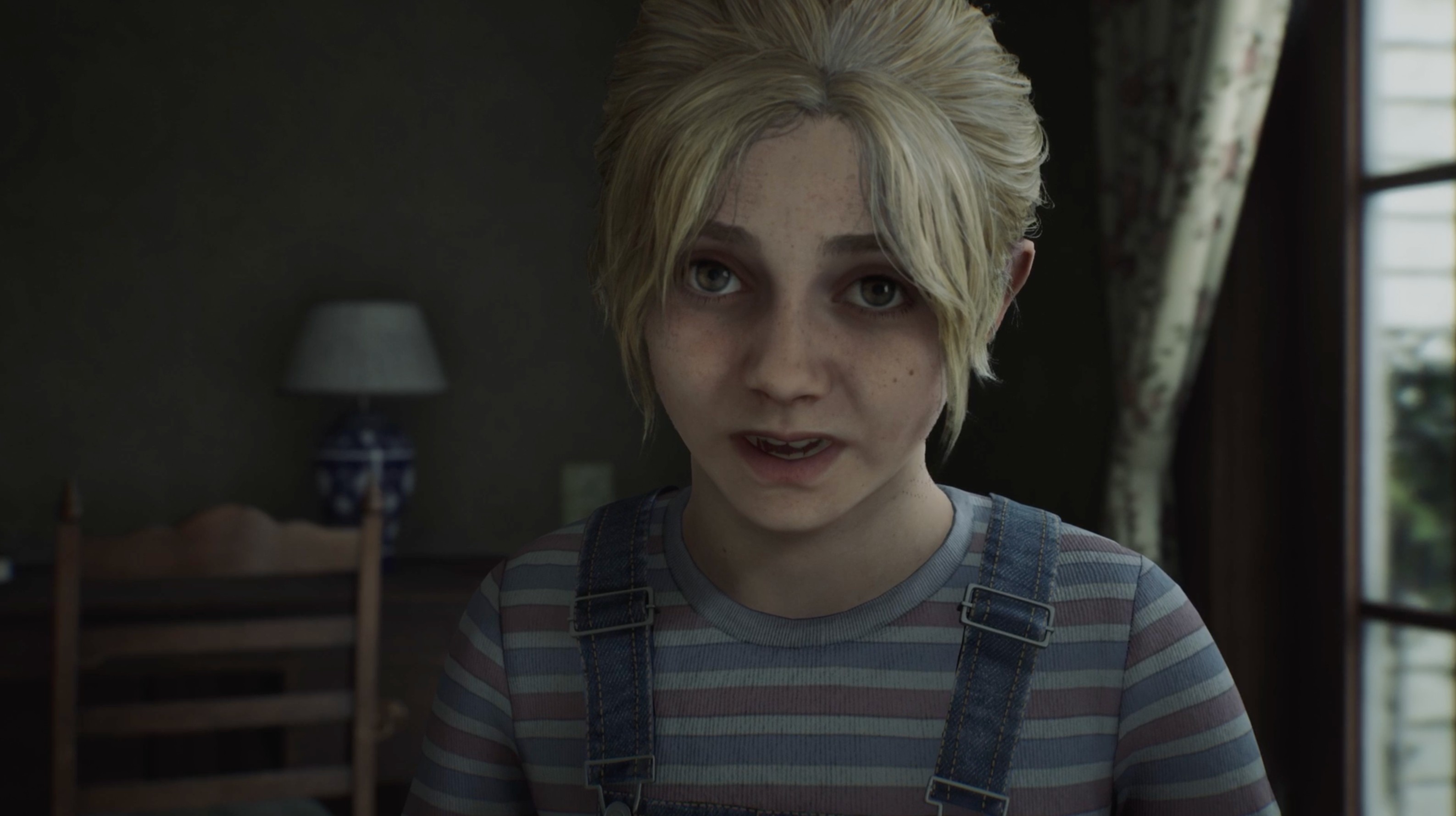 Hình ảnh một cô bé tóc vàng nhìn thẳng vào máy quay, mắt mở to trong Silent Hill 2 Remake