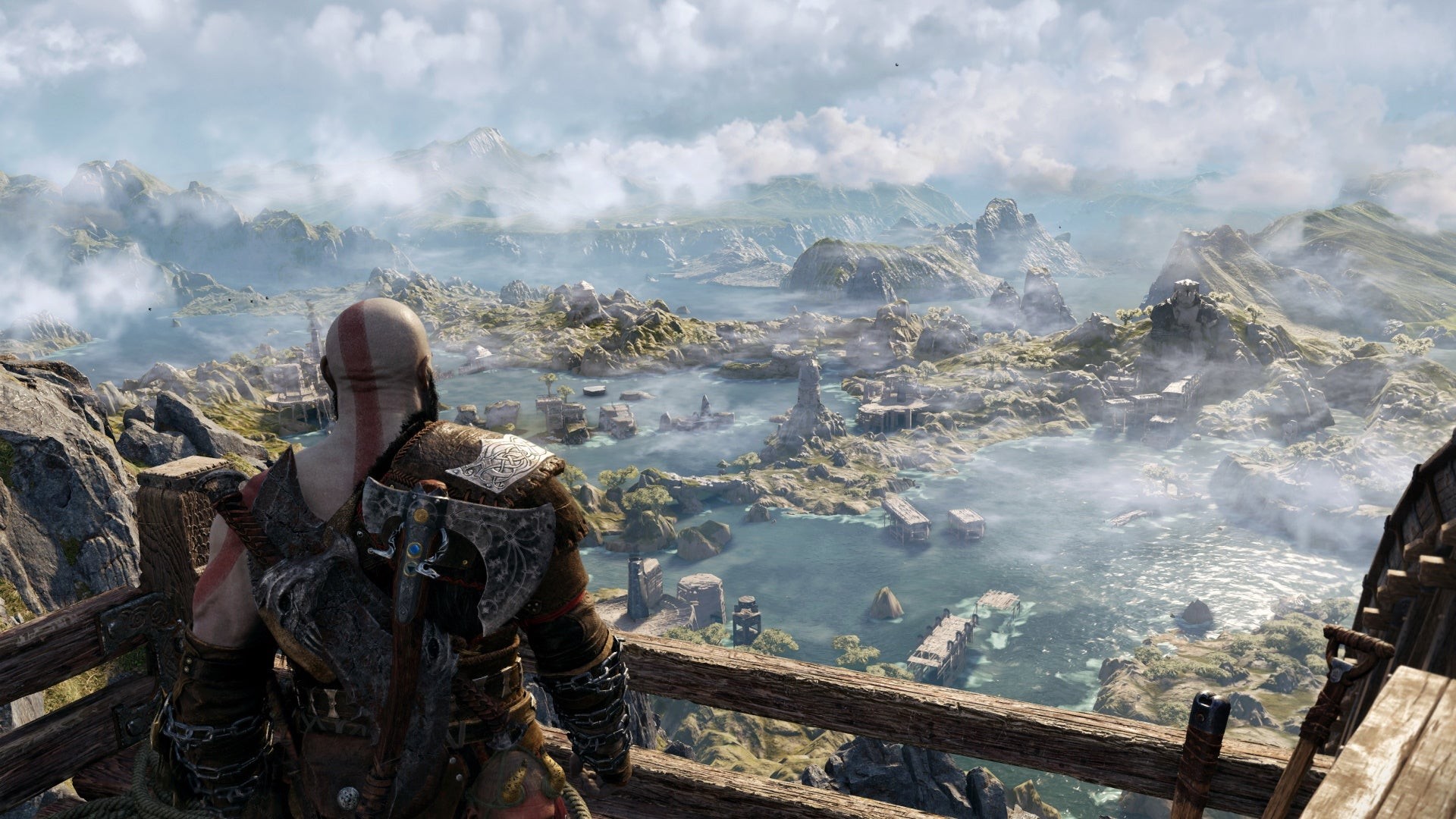 Kratos nhìn bao quát vùng đất Svartalfheim rộng lớn trong God of War Ragnarök
