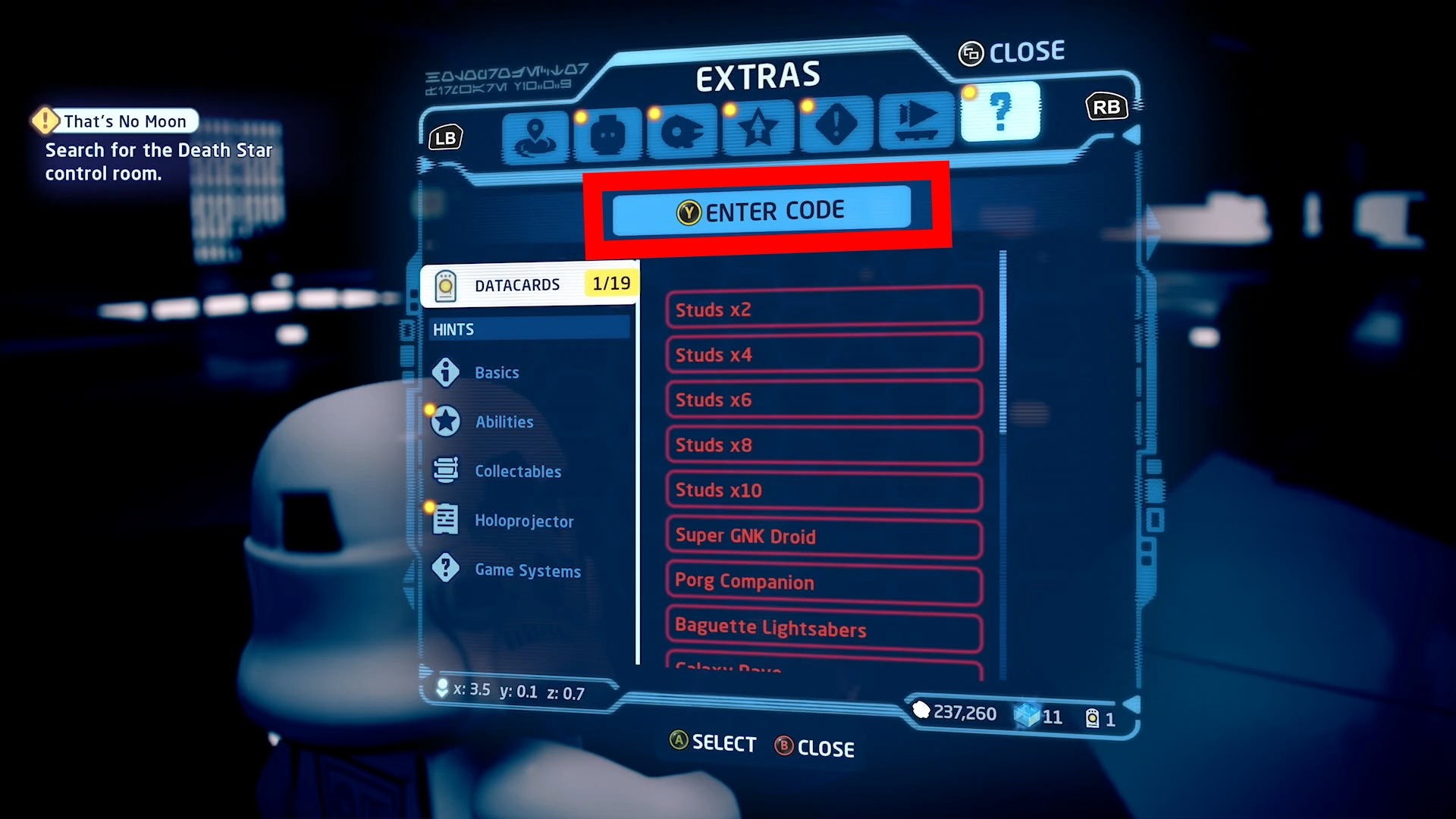 Menu Holoprojector trong Lego Star Wars Skywalker Saga với tab Extras để nhập mã cheat
