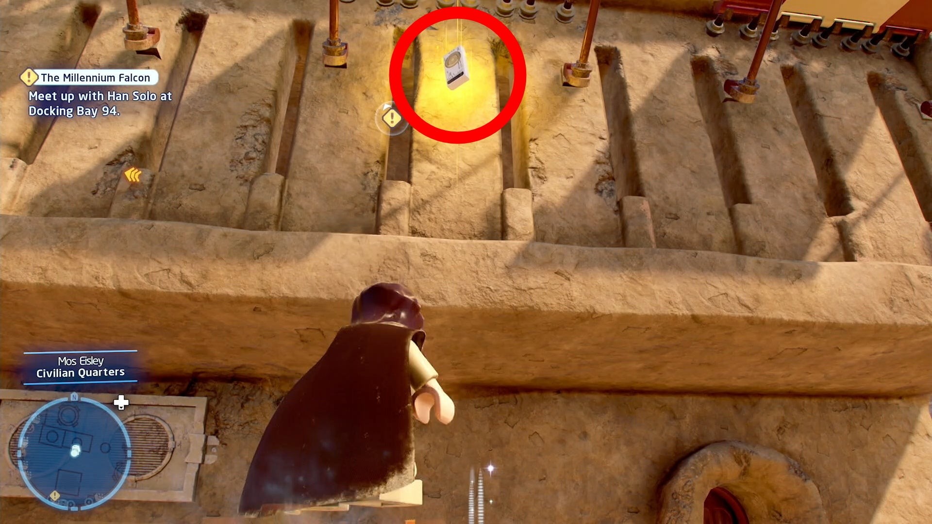 Một Datacard màu vàng phát sáng cần thu thập để mở khóa cheat trong Lego Star Wars Skywalker Saga