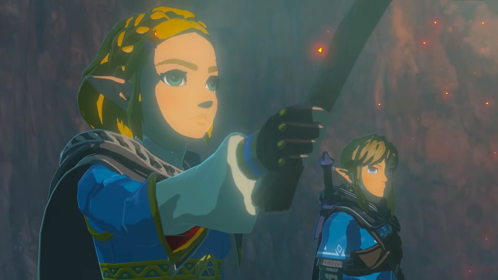 Zelda cầm đuốc cùng Link nhìn vào một vật thể trong Tears of the Kingdom